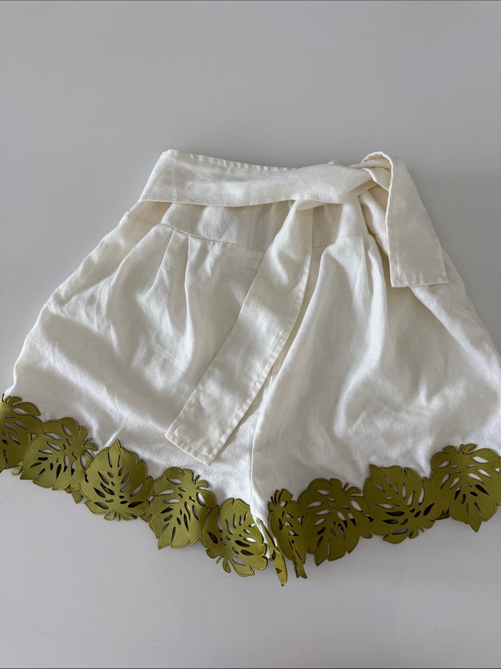 Bahia Maria Anthropologie Cream High-Waist Shorts with Olive Cutout Leaf Hem - Picture 5 of 5